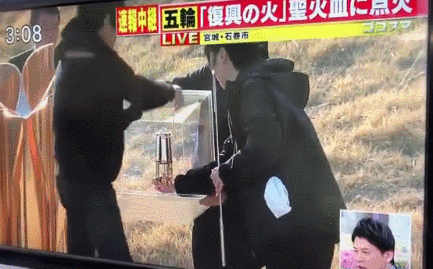 日本奥运圣火多次被大风吹灭