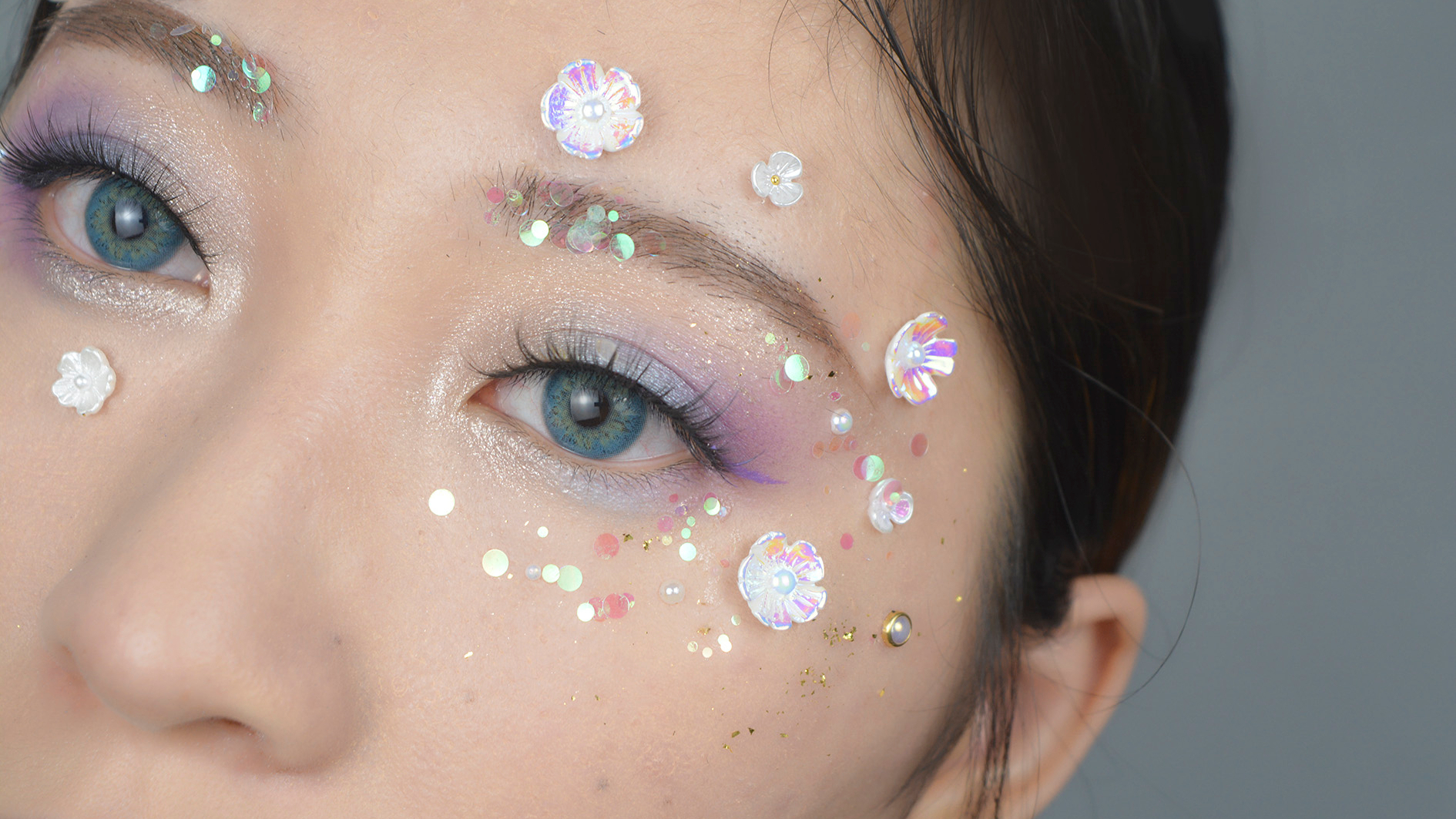 仙气十足的梦幻紫色琉璃花创意妆容